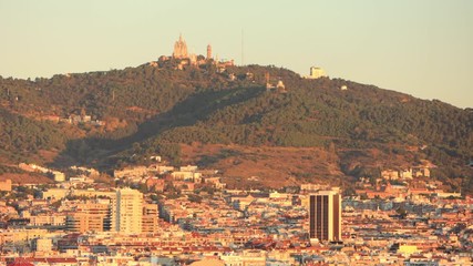 Wall Mural - The skyline of Barcelona, Spain at dawn