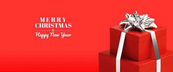Wall Mural - Merry Christmas and Happy New Year web banner. Red gifts box and silver bow ribbon on red background. 3d rendering illustration.