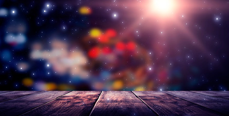 Wall Mural - wooden table, blurred bokeh background background. neon light, night view, close-up. the general bac