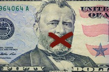 Closeup Of The Ulysses S Grant Face On The Dollar Bill With An X Painted On His Mouth
