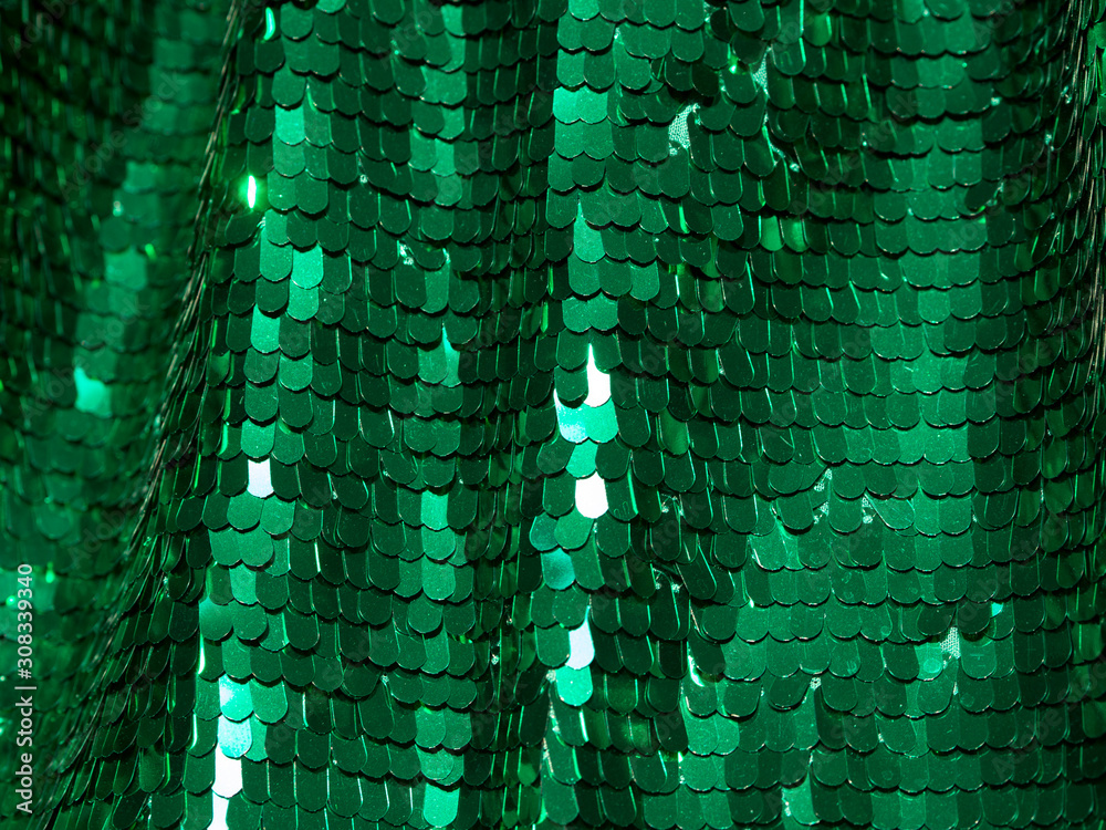 Spangle, sequin background. Shiny green mirror dress material cloth ...