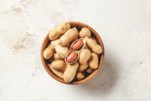Bowl With Peanuts On Light Background