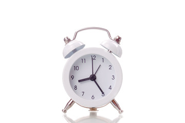 Wall Mural - White alarm clock on white background