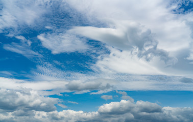 Beautiful blue sky and white cumulus clouds abstract background. Cloudscape background. Blue sky and fluffy white clouds on sunny day. Nature weather. Bright day sky for happy day background.