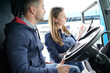 © goodluz - Logistics manager controlling truck driver schedule