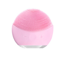 Modern electric face cleansing brush isolated on white, top view. Cosmetics tool