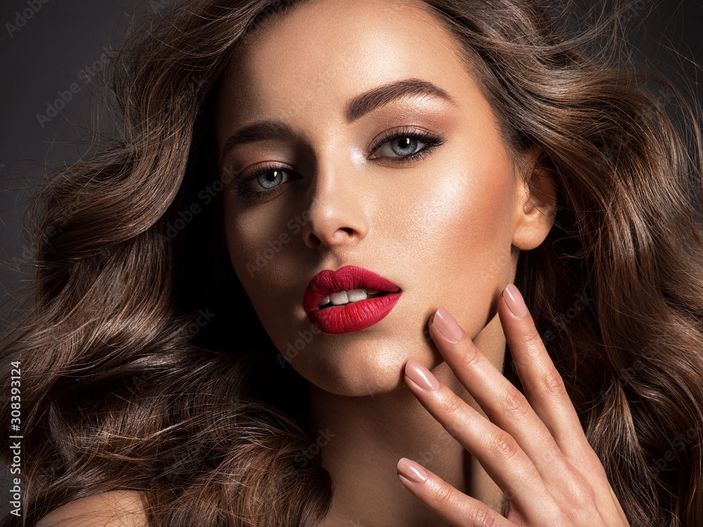  Beautiful face of an attractive model with red lipstick. - obrazy, fototapety, plakaty 
