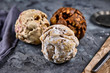 Different flavors of ball shaped traditional German sweet food called 'Schneeballen', meaning 'Snowball', made from shortcrust pastry, a speciality from tourist city Rothenburg