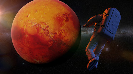 Wall Mural - astronaut flying towards planet mars