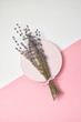 Greeting card with lavender bouquet on a round plate.