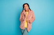 © deagreez - Portrait of her she nice attractive lovely positive glad cheerful cheery brunet girl wearing false fur jacket clothes isolated over bright vivid shine vibrant green blue turquoise color background