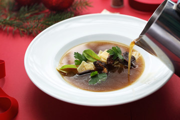 Mushroom soup, Christmas Eve soup Christmas dishes, traditional Christmas food. Composition of dishes on the holiday table. Horizontal culinary background