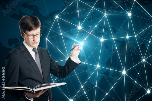 Businessman drawing digital polygons