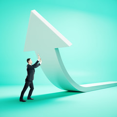 Aufkleber - Businessman holding white arrow.