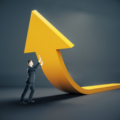 Aufkleber - Businessman holding yellow arrow.