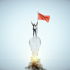 Canvas Print - Businesswoman with flag flying