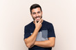 © luismolinero - Young handsome man with beard over isolated background smiling