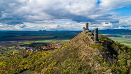 Castle Hazmburk. Ruines of Hazmburk castle on top of mountain peak of Ceske Stredohori range.  Medieval castle with views on czech countryside landscape near village Klapy, Libochovice, Czech Republic