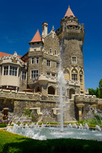 Gothic Revival Architecture Of Casa Loma Castle Tower In Toronto With Garden Fountain