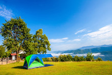 Tent Camping On The High Mountains With Blue Sky In Morning At Sri Nan Park,Nan Province ,Thailand
