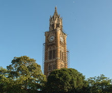 The Old, British-era Rajabai Clock Tower In The City Of Mumbai With Scaffolding Around It For Restoration And Repairs.