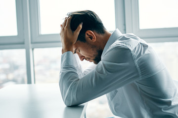 Wall Mural - man with headache