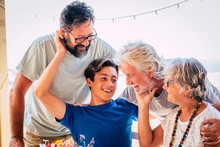 Family Caucasian Portrait Of Happy Cheerful Family With Three Generations From Grandson To Son And Grandfathers All Together Having Fun And Love - Concept Of Mixed Ages And Friendship
