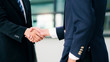 © Cavan Images - Businessmans handshake after good deal.