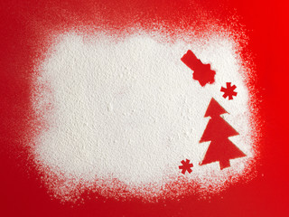 Wall Mural - Christmas tree on flour background. White flour looks like snow. Top view