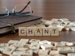 chant the word or concept represented by wooden letter tiles
