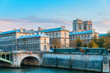View on Siene river, Notre Dame and Hotel-Dieu. Autumn city Paris, France. Beautiful Paris architecture.