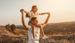 © kegfire - Father and daughter enjoying freedom in nature