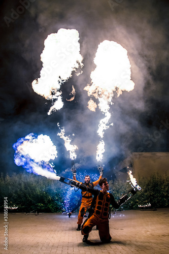 Fotomural Fire show, dancing with flame, male master fakir with fire works, performance ou