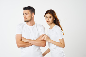 Wall Mural - young couple in t-shirts chatting