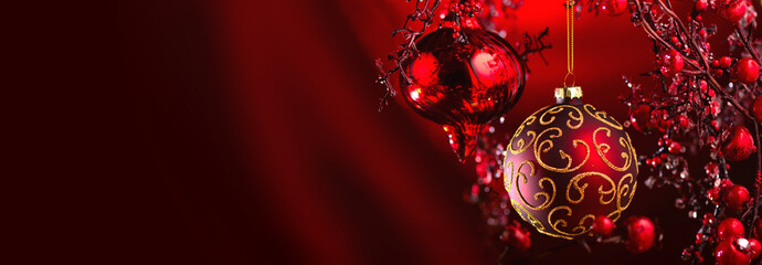 christmas and new year red decoration. abstract blurred bokeh holiday background with beautiful baub