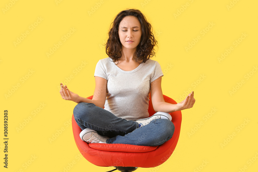 Beautiful woman meditating on color background - obrazy, fototapety, plakaty 
