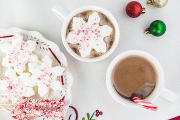 Wall Mural - Mugs of hot chocolate and variety of toppings for hot chocolate.