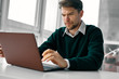 © SHOTPRIME STUDIO - young man working on his laptop