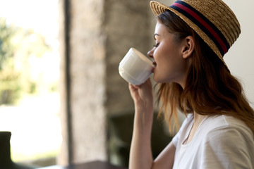 portrait of young woman in hat