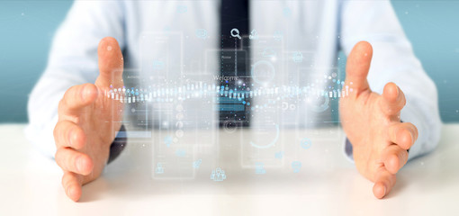 Poster - Businessman holding User interface screens with icon, stats and data 3d rendering