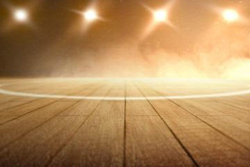 Canvas Print - Close up view of a basketball court with wooden floor and spotlights