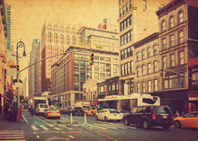City Life And Traffic On Manhattan Avenue ( Ladies' Mile Historic District) At Daylight , New York City, United States. Photo In Retro Style. Added Paper Texture. Toned Image
