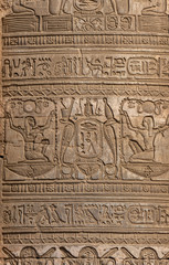 Wall Mural - Hieroglyphic carvings on the exterior walls of an ancient egyptian temple