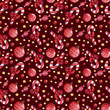 Seamless pattern with sweets and red berries on a red background with gifts,christmas toys.Christmas background for wrapping paper,greeting cards and scrapbooking.
