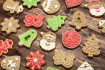 Wall Mural - Christmas gingerbread cookies on brown wooden table