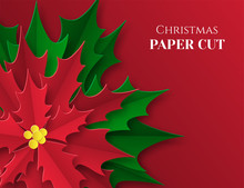 Background With A Red Flower. Christmas Poster In Paper Art Style. Poinsetia With Green And Red Leaves. Place For Text