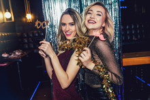 Girls Celebrating New Years Eve At The Nightclub. Group Of Female Friends Partying In Pub