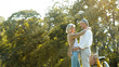 © Rapeepat - Senior Caucasian couple hugging in park. Family with a happy smile feels relaxed with nature in the morning. Or in the evening. Enter  elderly society And retire from work. Concept health insurance
