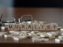 Muralist The Word Or Concept Represented By Wooden Letter Tiles
