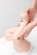© Dmitry Naumov - Little baby receiving osteopathic treatment of her leg